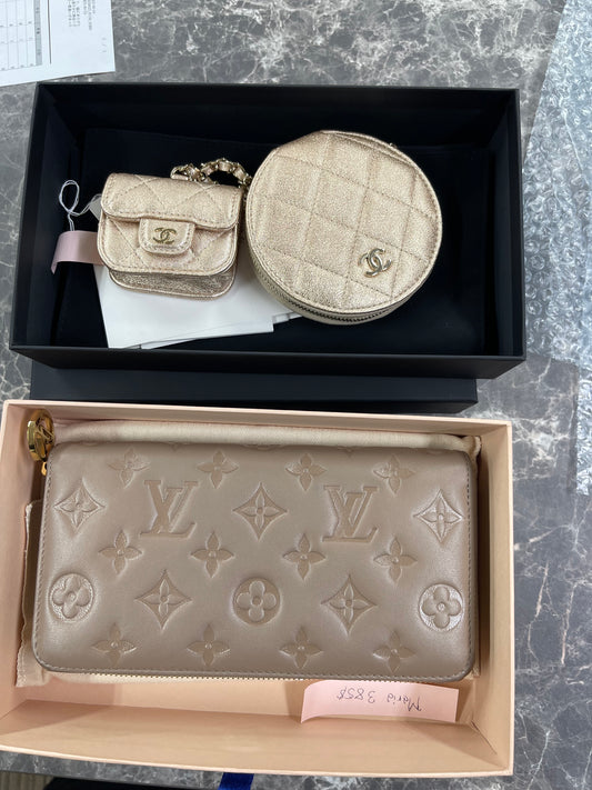 coin purse and Lv wallet