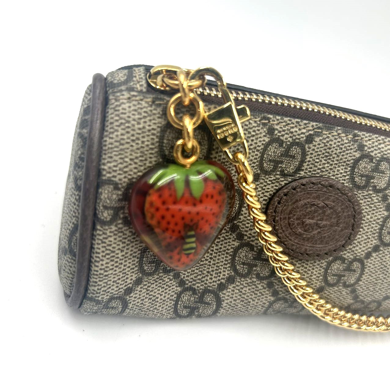 GUCCI<br>GG Supreme Monogram Strawberry  Pouch