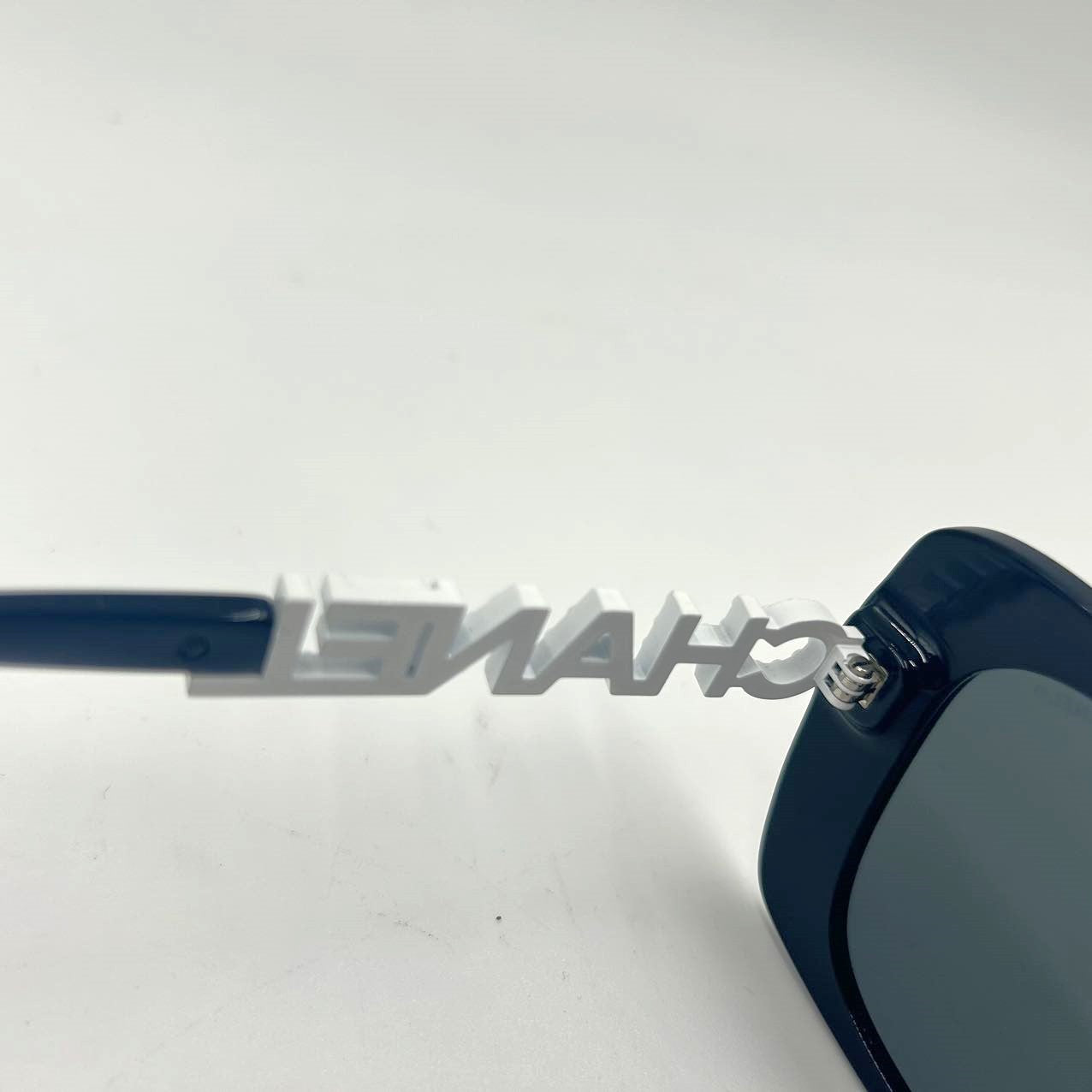 CHANEL<br>Bridge Logo Sunglasses