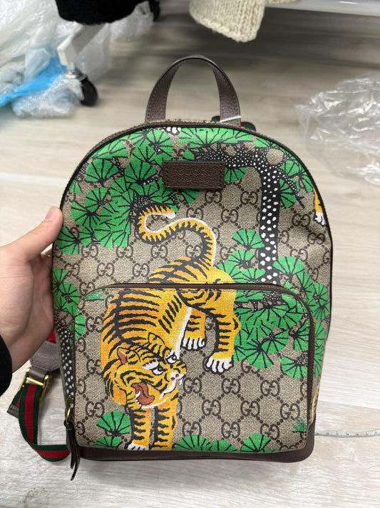 your gucci backpack