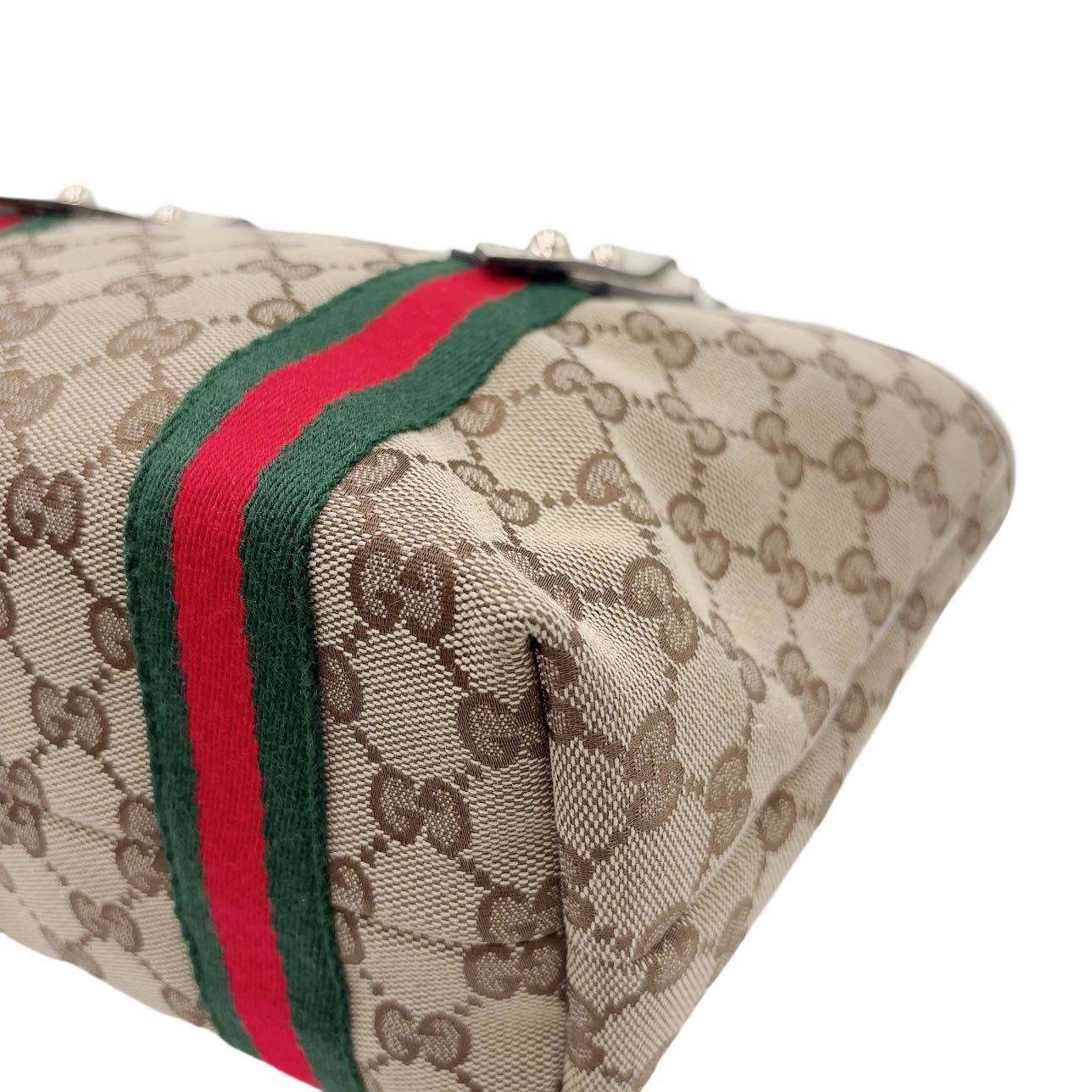 GUCCI<br> Mini sac à main en toile GG