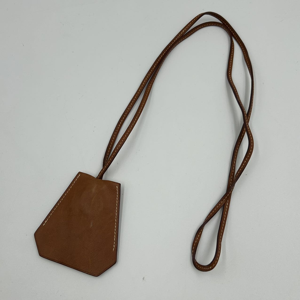 HERMES<br>Croisette Charm Brown