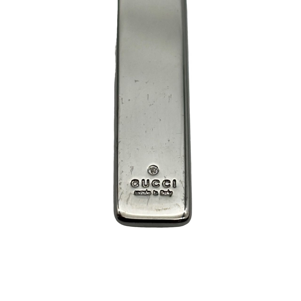 GUCCI<br> Sangle de téléphone à breloque en métal