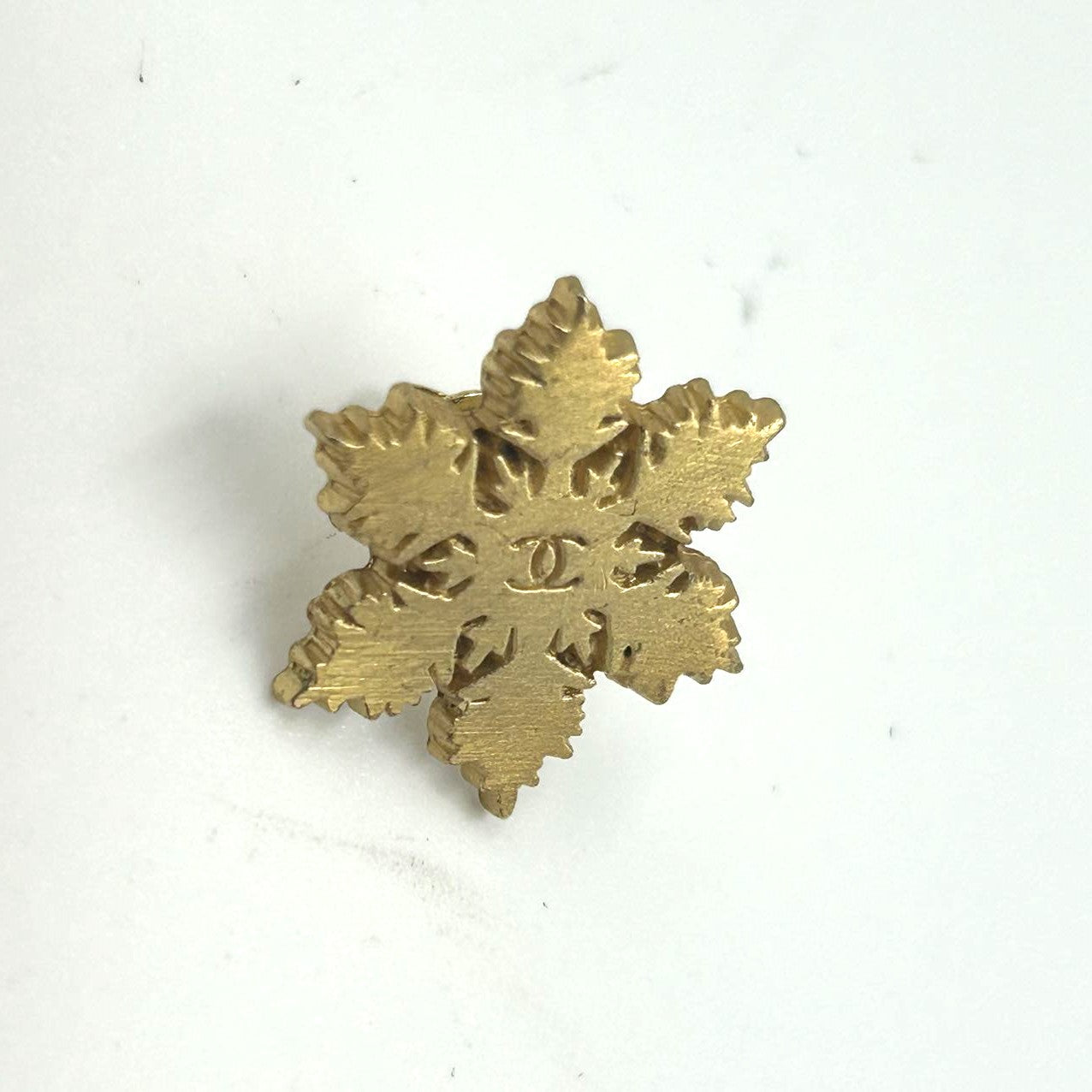 CHANEL<br>Snowflake Pierce Gold